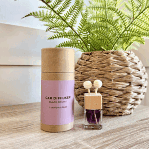 Car diffuser with Black Orchid scent in eco-friendly packaging and luxury fragrance oils.