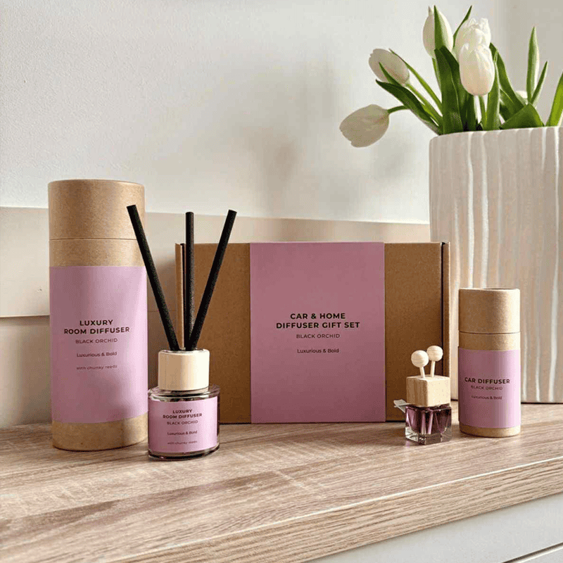 Luxury car fragrance gift set with black orchid scent and diffuser options.